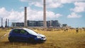 Oradea/Romania- Ã¢â¬Å½May Ã¢â¬Å½25, Ã¢â¬Å½2019: Blue Volkswagen Golf mk5 GTI on a grass field